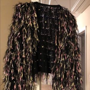 Multi color sweater.